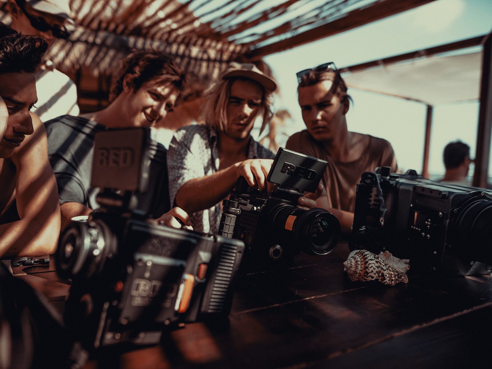 A table of cinema cameras at a workshop